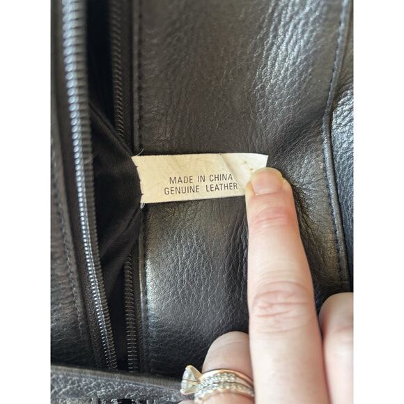 Tignanello Leather Sling Backpack Black Pocket Travel Minimal Festival - Picture 10 of 10